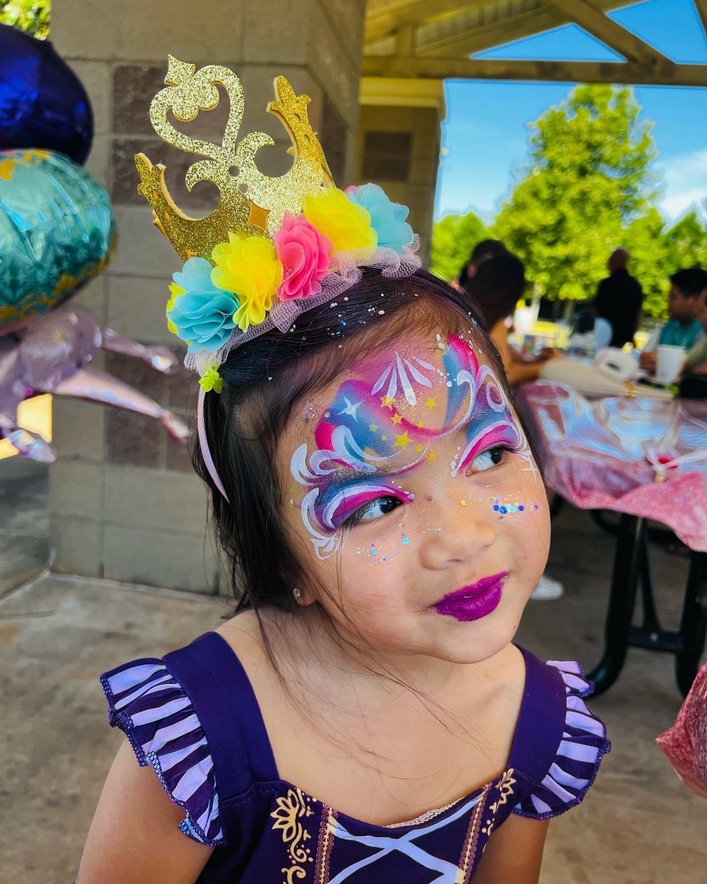 Girl with Unicorn Face Painting at Birthday Party | Confetti Jar