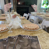 Table setting with plates, glasses, a baby shower in Atlanta.