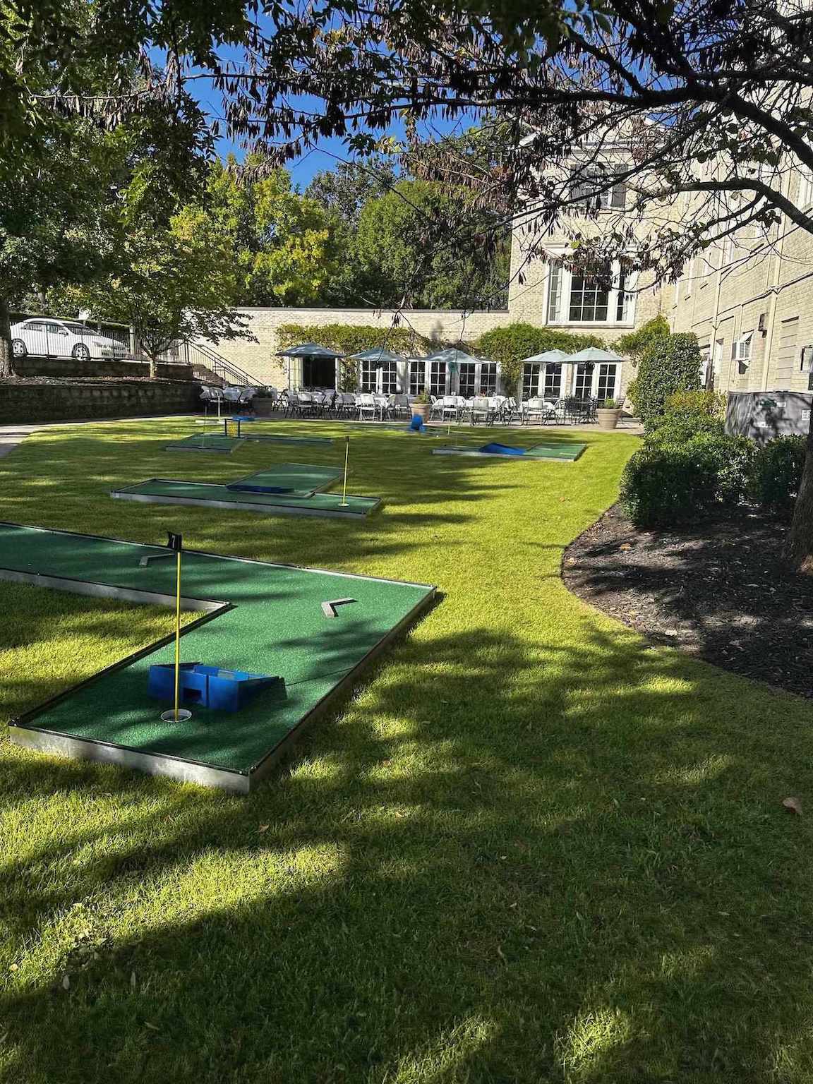 Mobile Miniature golf course set up at an event venue for a teen birthday party in Atlanta GA | Confetti Jar