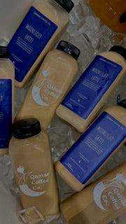 Collection of skincare products with visible branding on a dark background