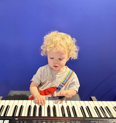 Boy at Music Birthday Party Alpharetta | Confetti Jar