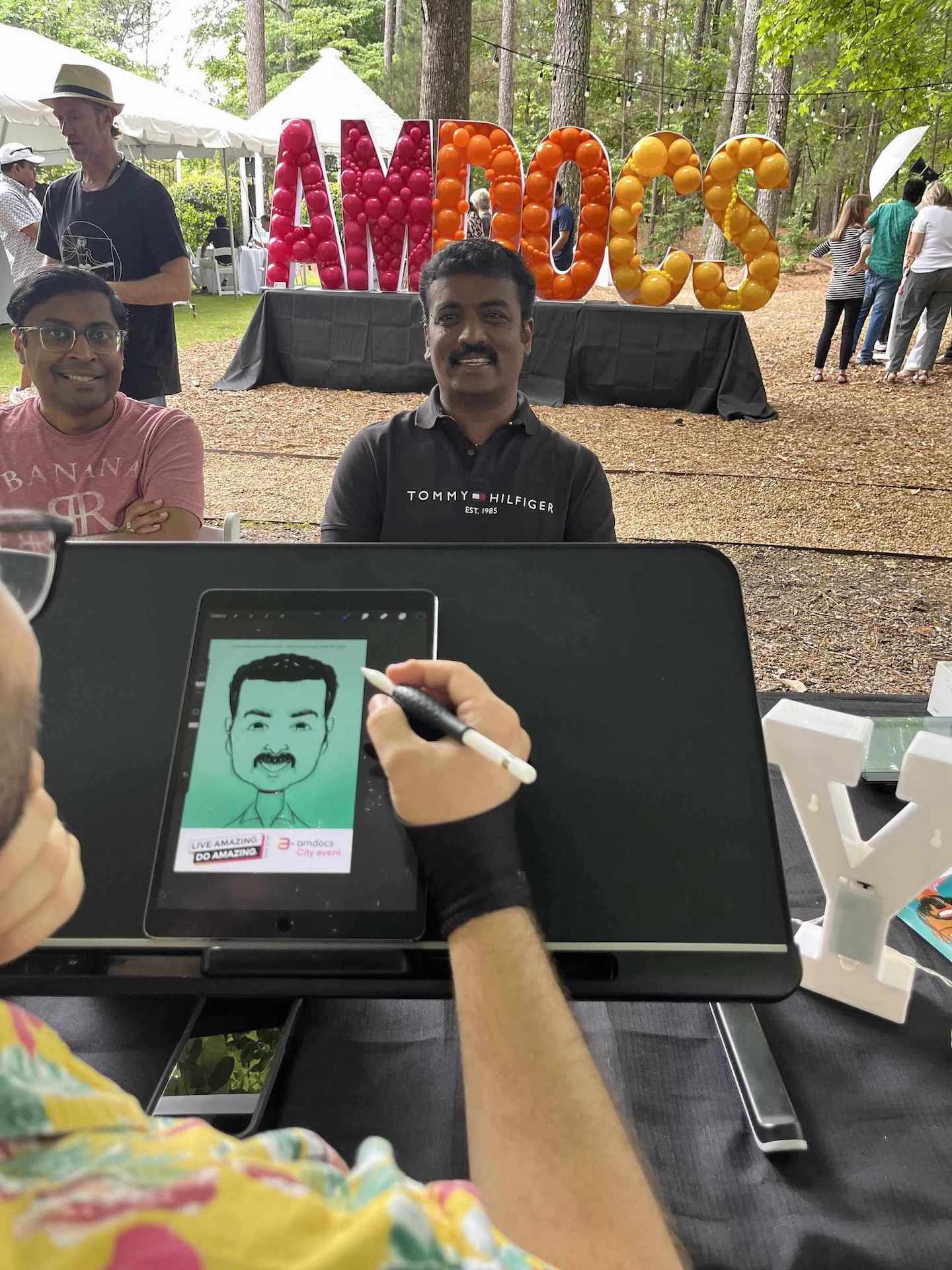 Live digital caricatures drawing at an event in Atlanta.