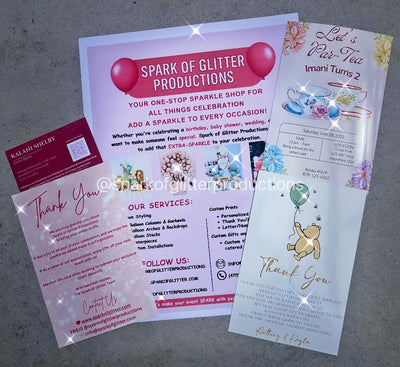 Three promotional flyers for Spark of Glitter Productions on a gray surface.