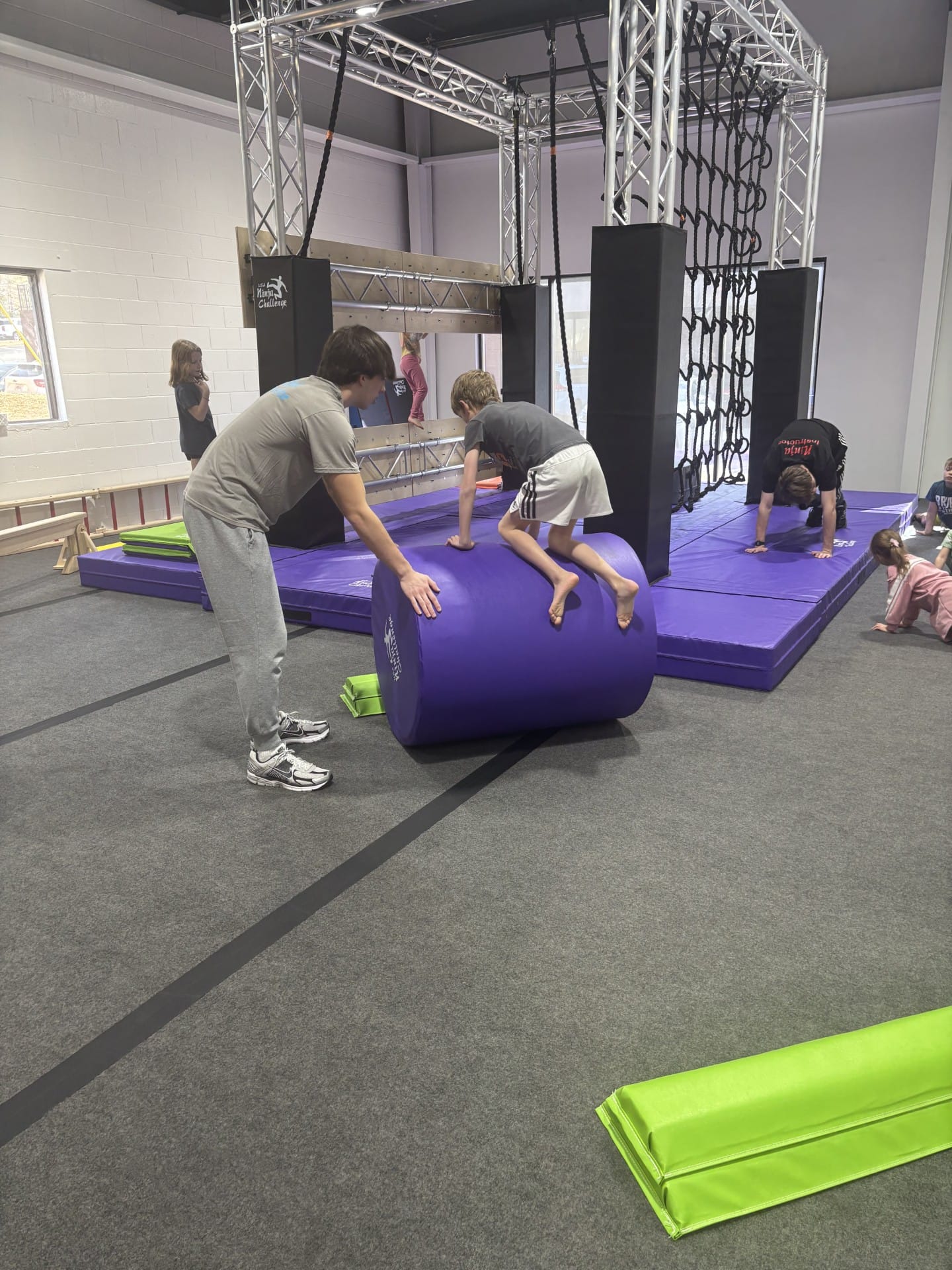 Boy Tumbling in Ninja Warrior Course Woodstock | Confetti Jar