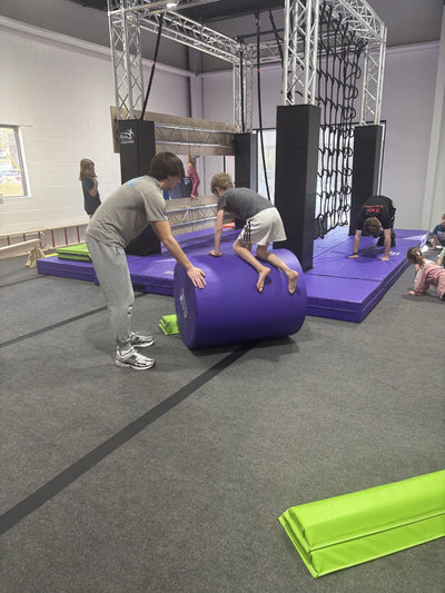 Boy Tumbling in Ninja Warrior Course Woodstock | Confetti Jar