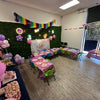Children's party setup with tables, balloons, and decorations at a birthday party for kids in Atlanta | Confetti Jar